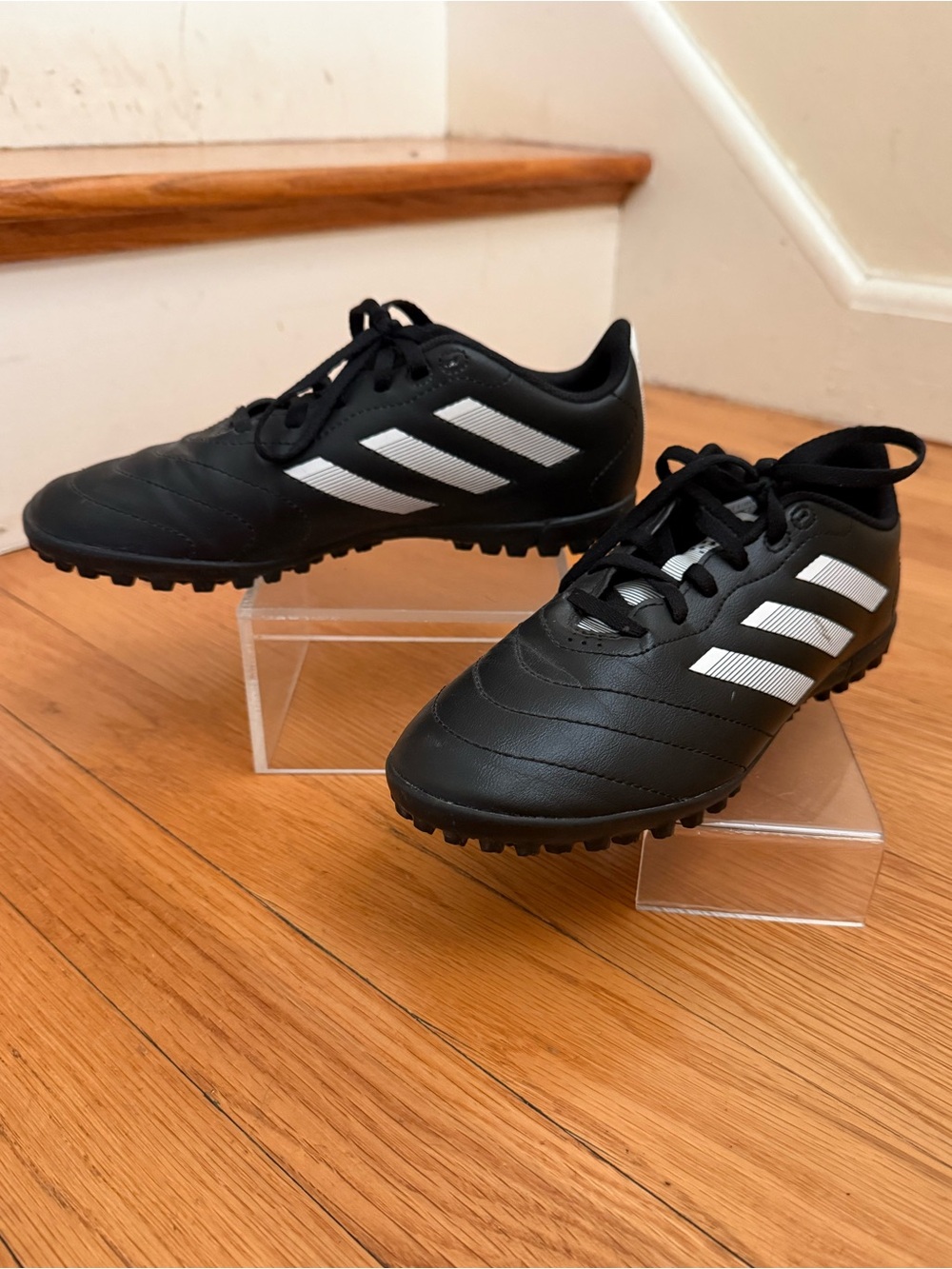 Adidas Kids indoor turf cleats.